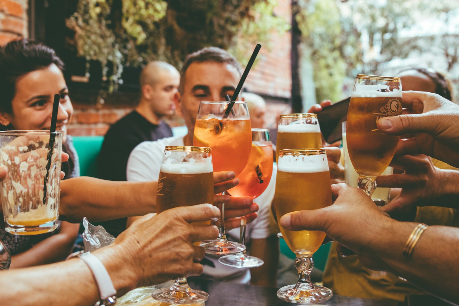 Friends toasting drinks on game day